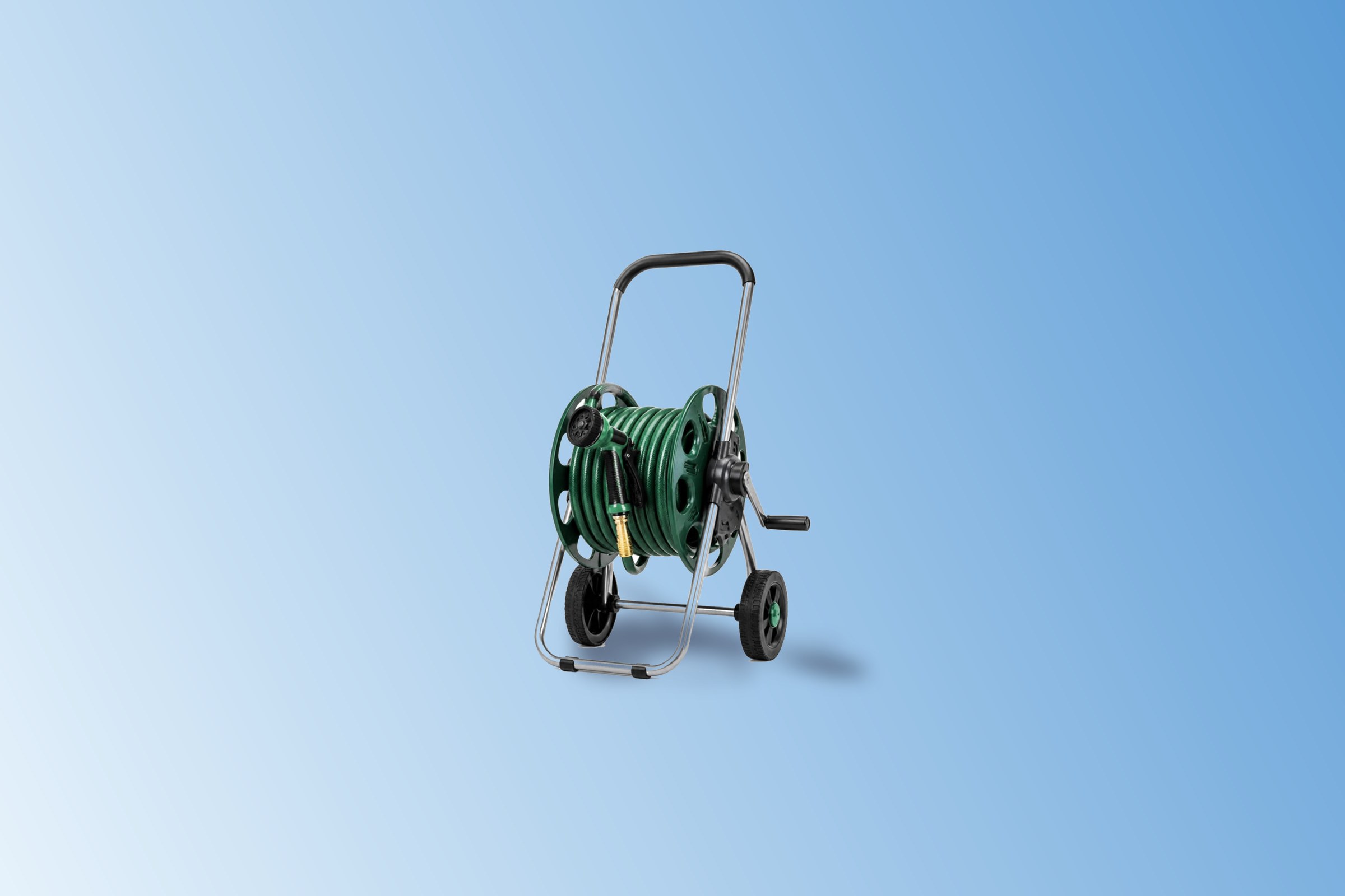 Garden hose reel cart with a coiled green hose